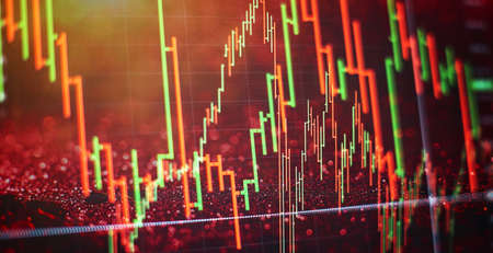 Businessman hand working on analyzing investment charts for Gold market, Forex market and Trading...