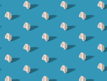 Minimal concept.Trendy braces pattern made with various braces on bright light blue background.