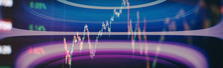 Technical price graph and indicator, red and green candlestick chart on blue theme screen, market volatility, up and down trend. Stock trading, crypto currency background.の写真素材