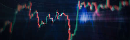 Analysis business accounting on info sheets. Businessman hand working on analyzing investment charts for Goldの写真素材