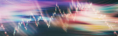 Analysis business accounting on info sheets. Businessman hand working on analyzing investment charts for Goldの写真素材