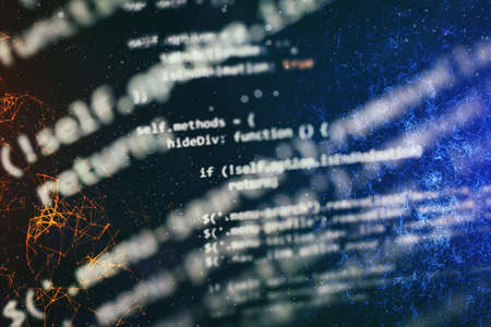 Simple website HTML code with colorful tags in browser view on dark backgroundの写真素材