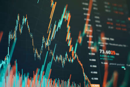 Computer and business strategy as concept. Financial diagram with candlestick chart used in market...