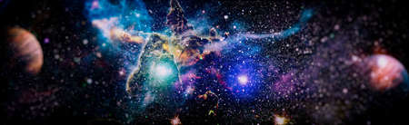 Nebula night starry sky in rainbow colors. Multicolor outer space. Star field and nebula in deep space many light years far from planet Earth.の写真素材