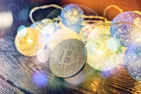 Technical graph of Bitcoin in futuristic concept. Golden bitcoins standing on circuit board, cryptocurrency concept.の写真素材