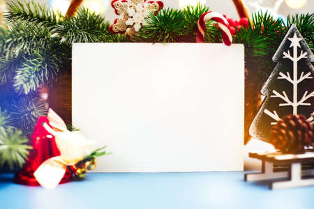 Wooden table decorated with Christmas gifts. Background with copy space mockup. Merry Christmas and happy new year.の写真素材