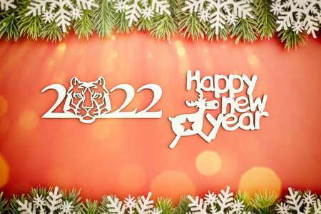 Sparkle bokeh lights on red canvas background. Merry christmas card. Winter holiday theme. Happy New...