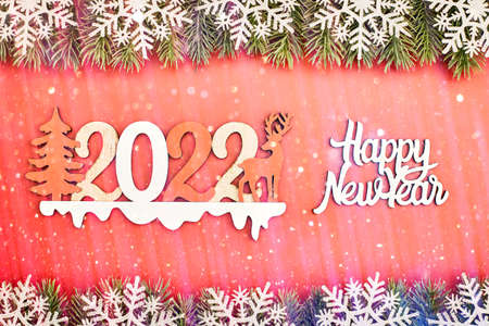 Sparkle bokeh lights on red canvas background. Merry christmas card. Winter holiday theme. Happy New...