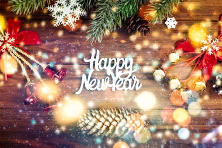 christmas or New Year dark wooden background, Xmas black board framed with season decorations, space for a text, view from aboveの写真素材