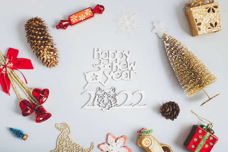 Christmas composition with red toys and checkered bow, holiday winter concept of new yearの写真素材