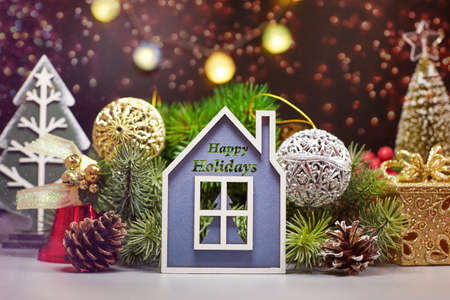 Holiday time. Happy New Year. Space for text.Christmas composition. Frame made of pine branches, fir cones on rustic vintage wooden background.の写真素材