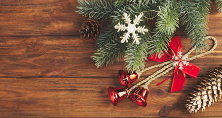 Merry christmas card. Christmas concept, New Year gifts. Copy space framed by Christmas tree branches, decorations, sweets.の写真素材