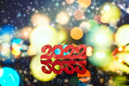 New Year 2022 decorate with LED cotton ball on black backgroundの写真素材