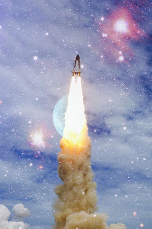 Spaceship takes off into the starry sky. Rocket starts into space. Concept, Elements of this image furnishedの写真素材