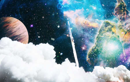 spaceship takes off into the night sky on a mission.Elements of this image furnishedの写真素材