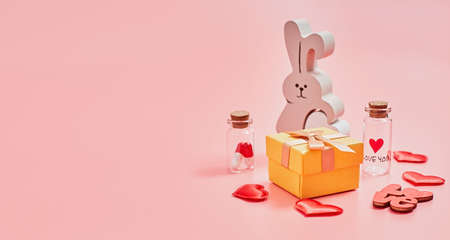 Gift box with beautiful red ribbon and rose, concept of Valentine's, anniversary, mother's day and birthday greeting, copyspace, topview. Flat lay, top view, copy spaceの写真素材