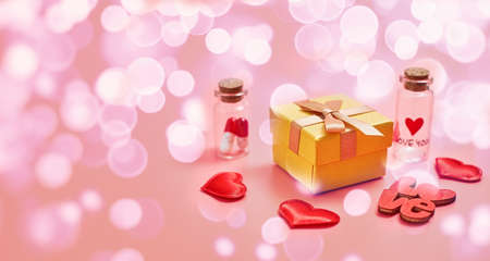 Gift box with beautiful red ribbon and rose, concept of Valentine's, anniversary, mother's day and birthday greeting, copyspace, topview. Flat lay, top view, copy spaceの写真素材