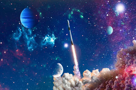 Rockets launch into space on the starry sky. Rocket starts into space concept.Elements of this image...