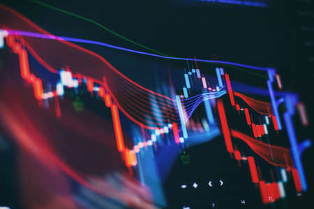 Digital graph interface over dark blue background. Concept of stock market and financial success.