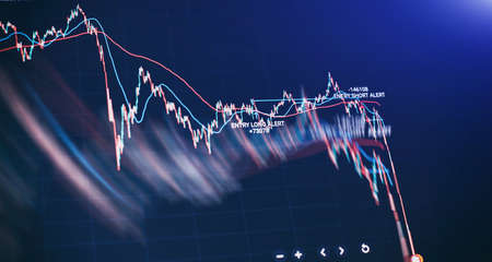 graph and indicator, red and green candlestick chart on blue theme screen, market volatility, up and...