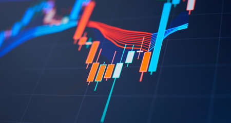 Analysis business accounting on info sheets. Businessman hand working on analyzing investment charts for Goldの写真素材