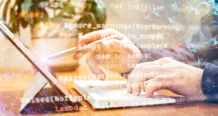 Payment Security Concept. Hacker in Black Gloves Hacking the System.の写真素材