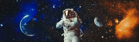 Picture of astronaut spacewalking with glowing stars . Astronaut in outer space.