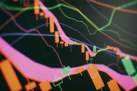 Technical price graph and indicator, red and green candlestick chart on blue theme screen, market volatility, up and down trend. Stock trading, cryptocurrencies background.の写真素材