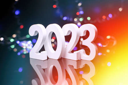 New Year 2023. Blurred lights in the background.