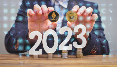 Businessman thinking about investing in cryptocurrency in 2023, choice between Ethereum and Bitcoin against the background of the chartの写真素材