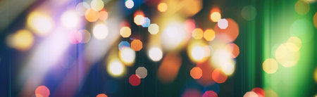 Abstract light celebration background with defocused golden lights for Christmas, New Year, Holiday, partyの写真素材
