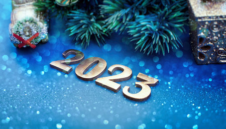 Christmas tree branches with snow and paper card note. flat lay. Nature New Year concept.