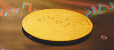 Bitcoins and New Virtual money concept. Gold bitcoins with Candle stick graph chart and digital background.の写真素材