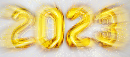 Happy new year 2023 celebration. Foil balloons numeral 2023 and with Glitter Stars .Flat lay