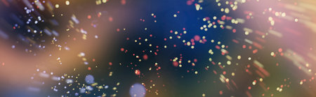 Abstract light celebration background with defocused golden lights, holiday partyの写真素材