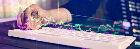 new concept of virtual money. Golden bitcoins with Candle stick graphic chart and digital