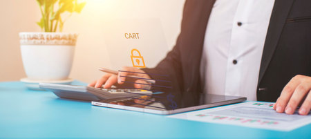 concept of optimizing tax payments using a calculator for calculating income tax and property, background for business, individuals and corporationsの写真素材