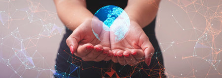 Woman holding a glowing earth globe on her hand a symbol of how to save nature