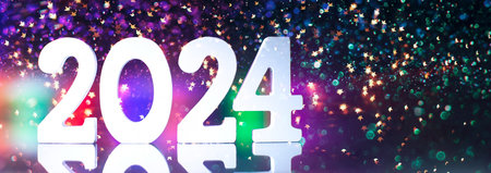 New Year's Eve 2024 Celebration Background.Christmas lights bokeh background. Holiday postcard....