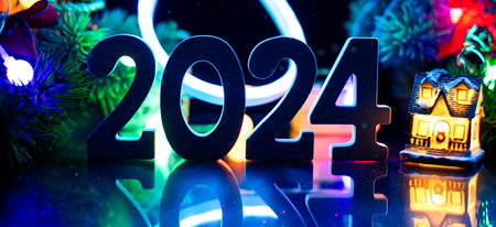 New Year's Eve 2024 Celebration Background.Christmas lights bokeh background. Holiday postcard....