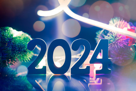 New Year's Eve 2024 Celebration Background.Christmas lights bokeh background. Holiday postcard....