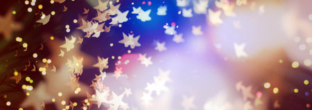 Abstract light celebration background with defocused golden lights for Christmas, New Year