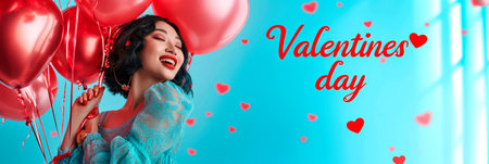 cute girl with balloons with inscription on blue background sign with the inscription Valentines dayの素材