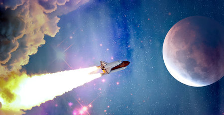 rockets launch into space on the starry sky. spacecraft flies into space with clouds of smoke.