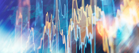 Charts of financial instruments with various type of indicators including volume analysis for professional technical analysis on the monitor of a computer.の写真素材