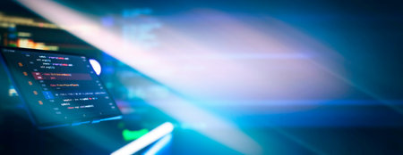 Writing programming code on laptop. Software source code. Programming code.の写真素材