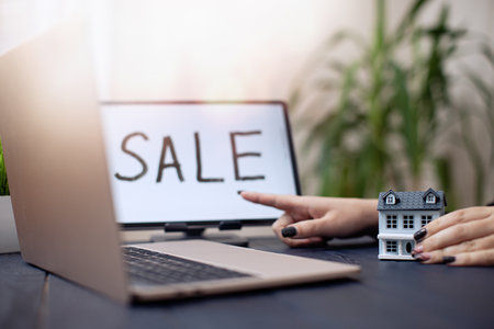 Modern Real Estate Sale Concept with Miniature Houseの写真素材