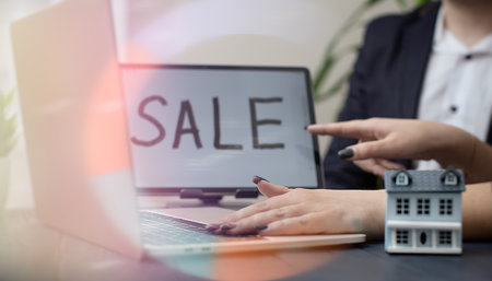 Modern Real Estate Sale Concept with Miniature Houseの写真素材