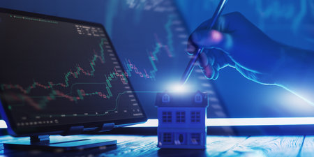Estate Investment and Stock Market Analysis 2025 Hand with Stylus Highlighting Growth Opportunities in Housingの写真素材