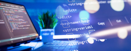 Work from home. Programmer coding code on notebook screen atの写真素材